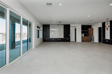 Experience modern luxury and energy-efficient living in this on Los Lagos Golf Club in Arizona - for sale on GolfHomes.com, golf home, golf lot