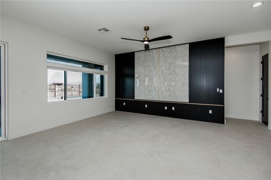 Experience modern luxury and energy-efficient living in this on Los Lagos Golf Club in Arizona - for sale on GolfHomes.com, golf home, golf lot