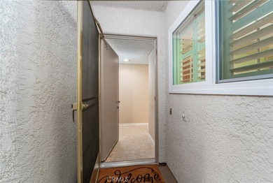 Welcome to this bright and inviting Villa Nueva model nestled in on Leisure Village Par 3 Golf Course in California - for sale on GolfHomes.com, golf home, golf lot