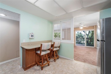 Welcome to this bright and inviting Villa Nueva model nestled in on Leisure Village Par 3 Golf Course in California - for sale on GolfHomes.com, golf home, golf lot