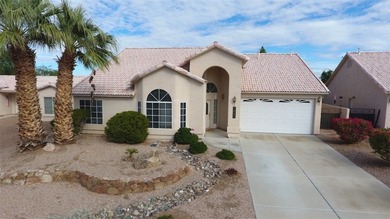 Step into this well designed 3 bedroom, 2 bathroom home offering on Desert Lakes Golf Course in Arizona - for sale on GolfHomes.com, golf home, golf lot