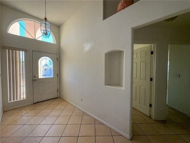 Step into this well designed 3 bedroom, 2 bathroom home offering on Desert Lakes Golf Course in Arizona - for sale on GolfHomes.com, golf home, golf lot