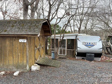 Ideal lake getaway in a true lake-life community. Beautifully on Old North State Club at Uwharrie Point Golf community in North Carolina - for sale on GolfHomes.com, golf home, golf lot