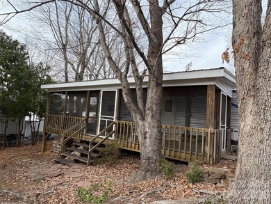 Ideal lake getaway in a true lake-life community. Beautifully on Old North State Club at Uwharrie Point Golf community in North Carolina - for sale on GolfHomes.com, golf home, golf lot