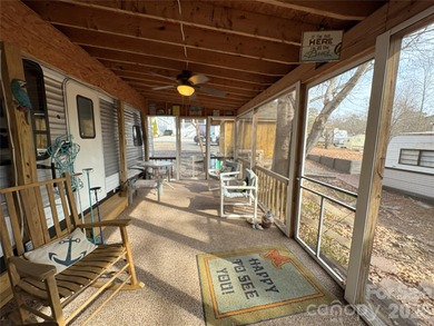 Ideal lake getaway in a true lake-life community. Beautifully on Old North State Club at Uwharrie Point Golf community in North Carolina - for sale on GolfHomes.com, golf home, golf lot