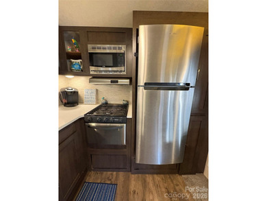 Ideal lake getaway in a true lake-life community. Beautifully on Old North State Club at Uwharrie Point Golf community in North Carolina - for sale on GolfHomes.com, golf home, golf lot