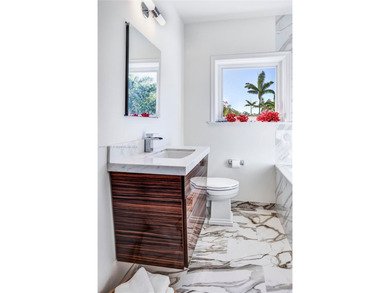 Magnificent mediterranean on private La Gorce Golf Course. Fully on La Gorce Country Club in Florida - for sale on GolfHomes.com, golf home, golf lot