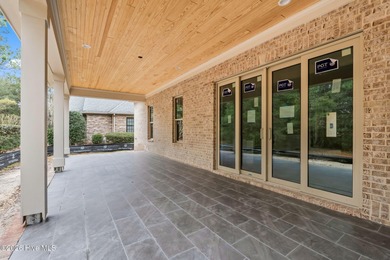 Located on a quiet cul-de-sac street within the Thistle Downs on Thistle Golf Club in North Carolina - for sale on GolfHomes.com, golf home, golf lot