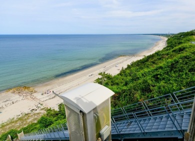 With both golf course views and ocean views, this White Cliffs on White Cliffs Country Club in Massachusetts - for sale on GolfHomes.com, golf home, golf lot