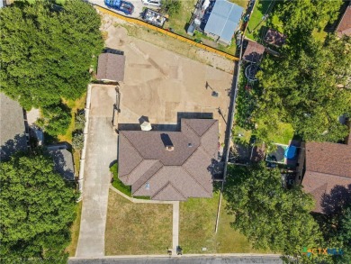 This three bedroom, two bath is on an oversized lot and located on Stonetree Golf Club in Texas - for sale on GolfHomes.com, golf home, golf lot