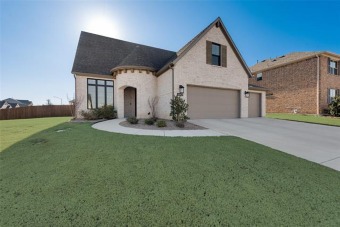 Less than 2 years old, shows like New Construction!  In the on Eagle Mountain Country Club  in Texas - for sale on GolfHomes.com, golf home, golf lot