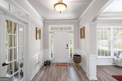 CUSTOM MODEL HOME with RICH UPGRADES and NEW FLOORING AND on Sugar Hill Golf Club in Georgia - for sale on GolfHomes.com, golf home, golf lot