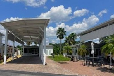 Welcome to an outstanding opportunity to own a premium Class A on Deer Creek RV Golf Resort in Florida - for sale on GolfHomes.com, golf home, golf lot