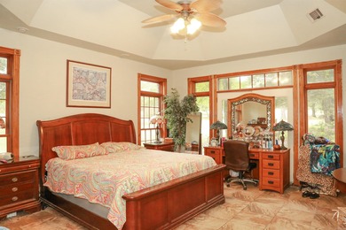 Welcome to 10812 Bay Ridge Drive -- a beautiful two-story home on Lions Den Golf Club in Arkansas - for sale on GolfHomes.com, golf home, golf lot