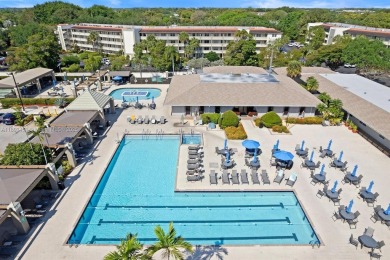 Welcome to Wynmoor, an active adult community offering on Wynmoor Golf Course in Florida - for sale on GolfHomes.com, golf home, golf lot