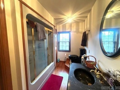 Welcome to 10812 Bay Ridge Drive -- a beautiful two-story home on Lions Den Golf Club in Arkansas - for sale on GolfHomes.com, golf home, golf lot