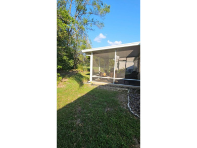 Ready to relax in a 55+ Active Community?  This open floor plan on Scotland Yards Golf Club in Florida - for sale on GolfHomes.com, golf home, golf lot