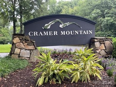 Welcome to your dream opportunity! Location is everything, and on Cramer Mountain Country Club in North Carolina - for sale on GolfHomes.com, golf home, golf lot