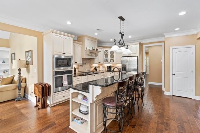 This beautiful home in the gated Grand Harbor community offers a on The Patriot Golf Club At Grand Harbor in South Carolina - for sale on GolfHomes.com, golf home, golf lot