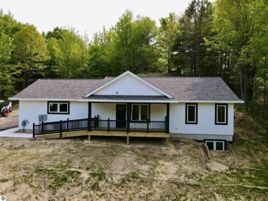 Modern New Construction in the Heart of Leelanau County. Nestled on Manitou Passage Golf Club in Michigan - for sale on GolfHomes.com, golf home, golf lot