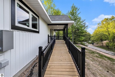 Modern New Construction in the Heart of Leelanau County. Nestled on Manitou Passage Golf Club in Michigan - for sale on GolfHomes.com, golf home, golf lot