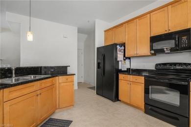 Lovely Santa Rosa townhouse features three bedrooms and a den on Lely Resort Golf and Country Club in Florida - for sale on GolfHomes.com, golf home, golf lot