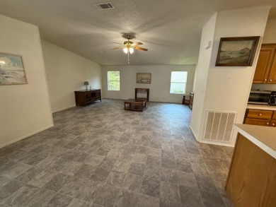 This 1560 square foot home has a unique very spacious floor on Whisperwood Golf Course in Florida - for sale on GolfHomes.com, golf home, golf lot