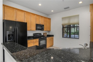 Lovely Santa Rosa townhouse features three bedrooms and a den on Lely Resort Golf and Country Club in Florida - for sale on GolfHomes.com, golf home, golf lot
