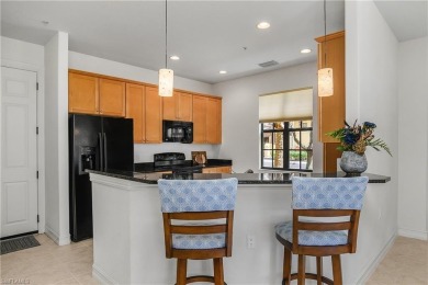 Lovely Santa Rosa townhouse features three bedrooms and a den on Lely Resort Golf and Country Club in Florida - for sale on GolfHomes.com, golf home, golf lot