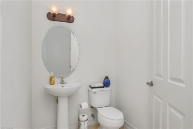 Lovely Santa Rosa townhouse features three bedrooms and a den on Lely Resort Golf and Country Club in Florida - for sale on GolfHomes.com, golf home, golf lot