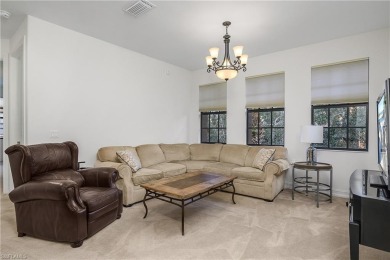 Lovely Santa Rosa townhouse features three bedrooms and a den on Lely Resort Golf and Country Club in Florida - for sale on GolfHomes.com, golf home, golf lot