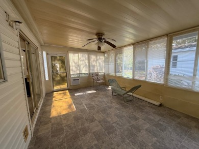 This 1560 square foot home has a unique very spacious floor on Whisperwood Golf Course in Florida - for sale on GolfHomes.com, golf home, golf lot