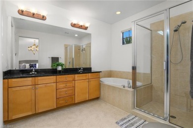 Lovely Santa Rosa townhouse features three bedrooms and a den on Lely Resort Golf and Country Club in Florida - for sale on GolfHomes.com, golf home, golf lot
