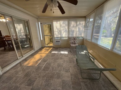 This 1560 square foot home has a unique very spacious floor on Whisperwood Golf Course in Florida - for sale on GolfHomes.com, golf home, golf lot