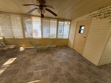 This 1560 square foot home has a unique very spacious floor on Whisperwood Golf Course in Florida - for sale on GolfHomes.com, golf home, golf lot