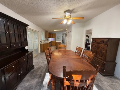 This 1560 square foot home has a unique very spacious floor on Whisperwood Golf Course in Florida - for sale on GolfHomes.com, golf home, golf lot