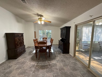 This 1560 square foot home has a unique very spacious floor on Whisperwood Golf Course in Florida - for sale on GolfHomes.com, golf home, golf lot