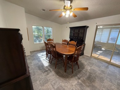 This 1560 square foot home has a unique very spacious floor on Whisperwood Golf Course in Florida - for sale on GolfHomes.com, golf home, golf lot