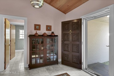 Exceptional! Beautifully renovated Mid-Century Modern sited on on Pine Valley Country Club in North Carolina - for sale on GolfHomes.com, golf home, golf lot