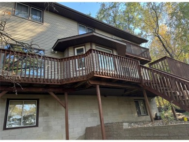 Tucked away on a wooded double-parcel lot, this exceptional on Redwood Falls Golf Club in Minnesota - for sale on GolfHomes.com, golf home, golf lot
