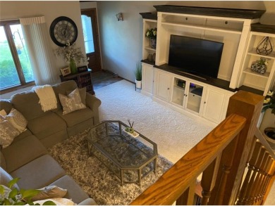 Tucked away on a wooded double-parcel lot, this exceptional on Redwood Falls Golf Club in Minnesota - for sale on GolfHomes.com, golf home, golf lot