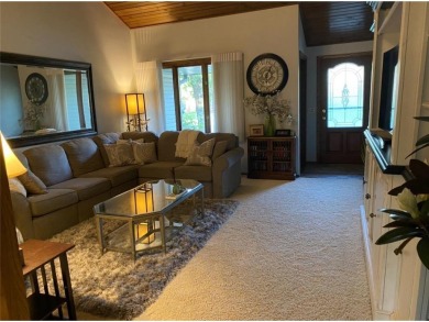 Tucked away on a wooded double-parcel lot, this exceptional on Redwood Falls Golf Club in Minnesota - for sale on GolfHomes.com, golf home, golf lot