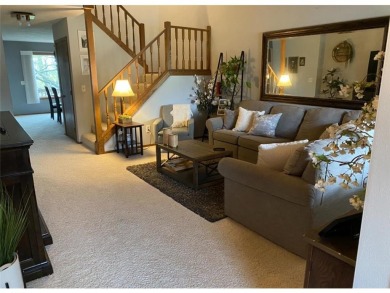 Tucked away on a wooded double-parcel lot, this exceptional on Redwood Falls Golf Club in Minnesota - for sale on GolfHomes.com, golf home, golf lot