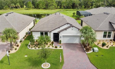 This gorgeous and highly sought-after Brava model, BUILT IN 2022 on Stonegate Golf Club in Florida - for sale on GolfHomes.com, golf home, golf lot