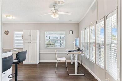 A beautifully updated 2-bedroom, 1-bathroom manufactured home in on Polo Park East in Florida - for sale on GolfHomes.com, golf home, golf lot