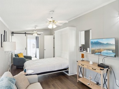 A beautifully updated 2-bedroom, 1-bathroom manufactured home in on Polo Park East in Florida - for sale on GolfHomes.com, golf home, golf lot