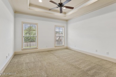 Great curb appeal on this four bedroom three bath home in Lake on Lake Caroline Golf Club in Mississippi - for sale on GolfHomes.com, golf home, golf lot