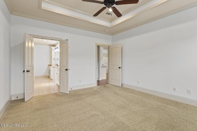 Great curb appeal on this four bedroom three bath home in Lake on Lake Caroline Golf Club in Mississippi - for sale on GolfHomes.com, golf home, golf lot