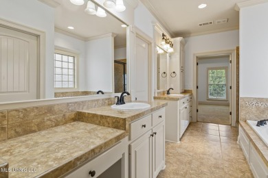 Great curb appeal on this four bedroom three bath home in Lake on Lake Caroline Golf Club in Mississippi - for sale on GolfHomes.com, golf home, golf lot
