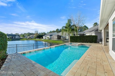 Beautifully renovated POOL w/ SPA home overlooking a serene lake on St. Johns Golf and Country Club in Florida - for sale on GolfHomes.com, golf home, golf lot